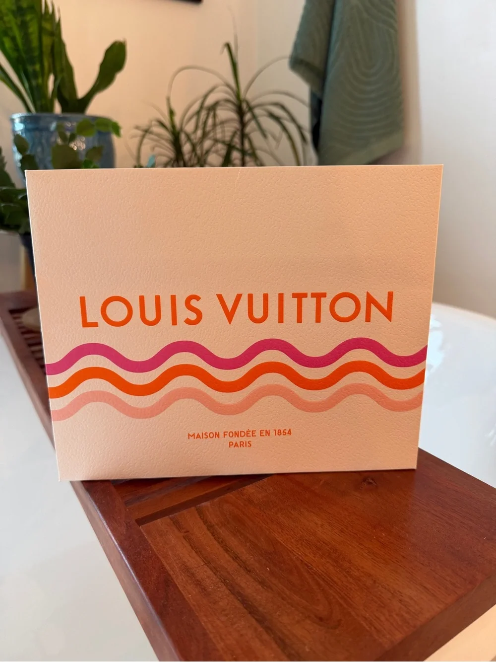 Louis Vuitton Cream Cosmetic Pouch with Pink & Orange Monogram.